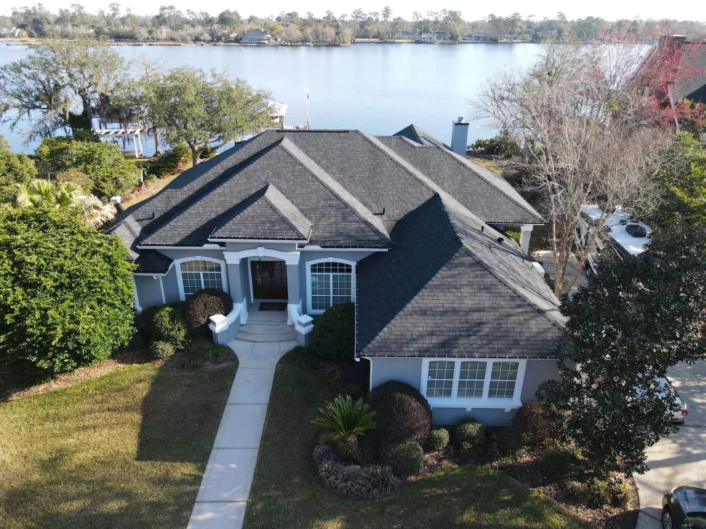 Universal Roof crew completing a residential roof replacement