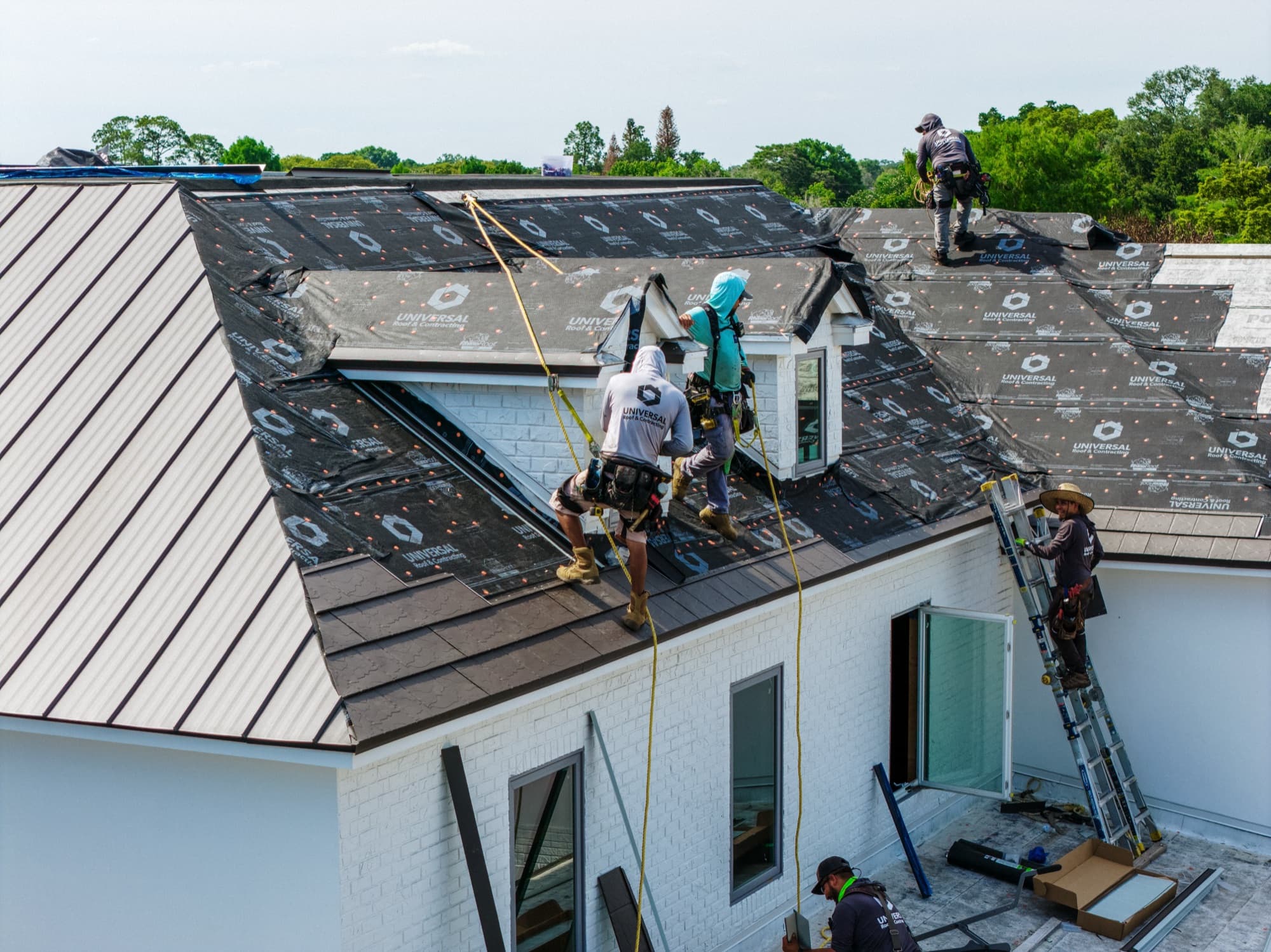 Universal Roof crew at work on a Florida roof