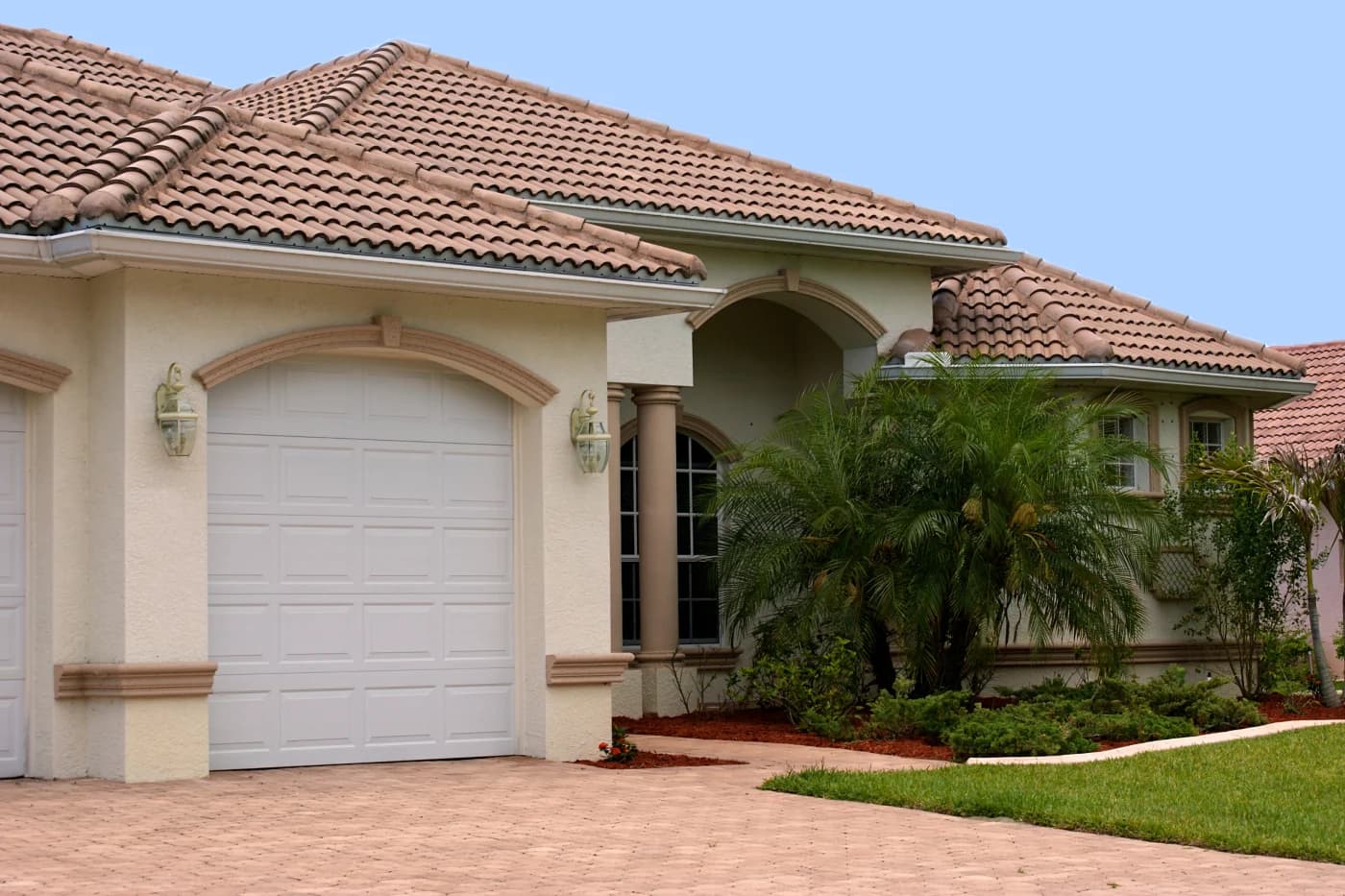 Barrel tile roof on a Mediterranean-style Orlando home under a blue sky