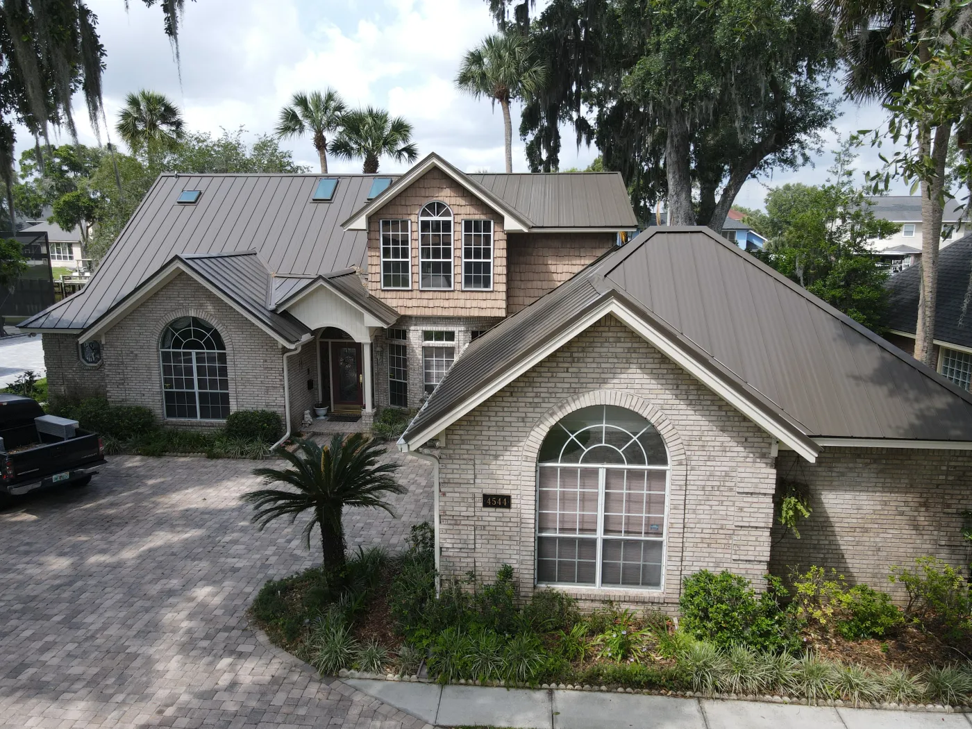 brown metal roof on estate home in Jacksonville FL Universal Roof brown metal roof on estate home in Jacksonville FL Universal Roof