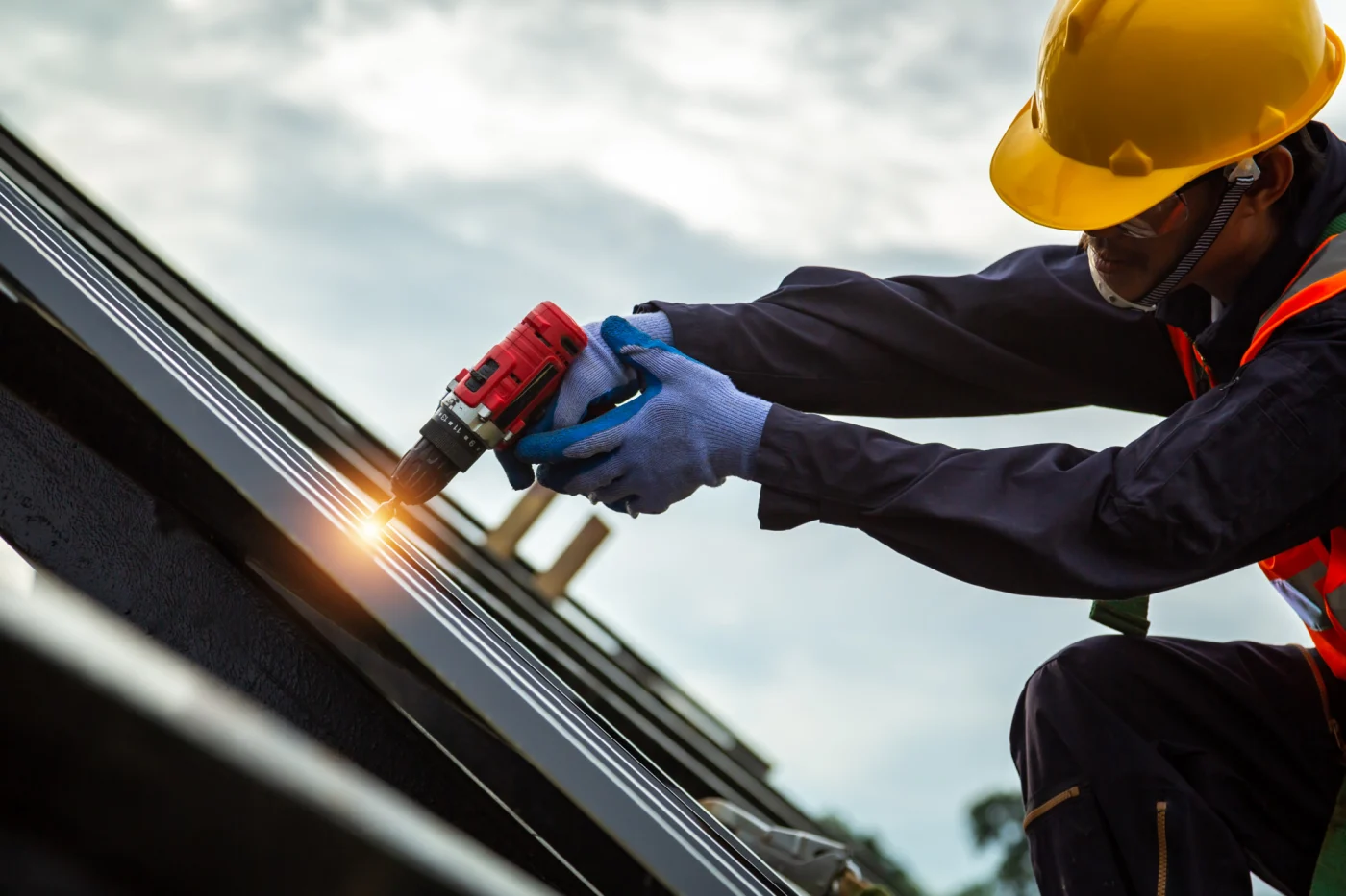 Roofing repairing a roof