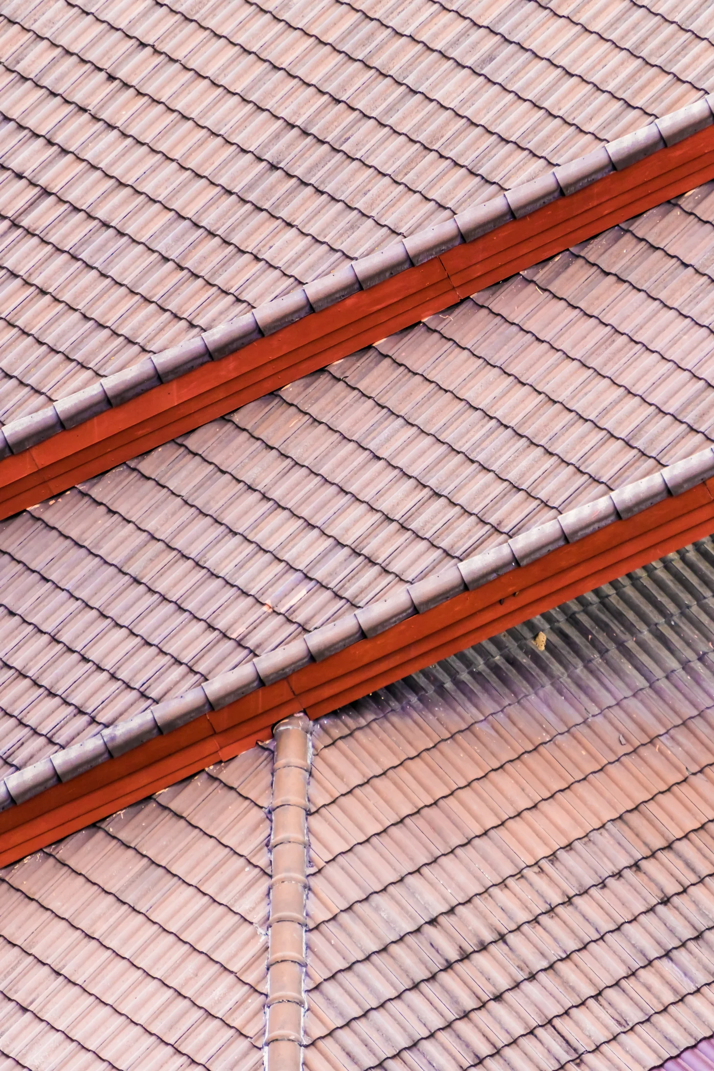 Close-up of red Spanish tiles on a roof