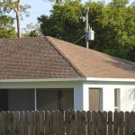 Closeup Of House Roof Top Covered With Asphalt Or Bitumen Shingles. Waterproofing Of New Building