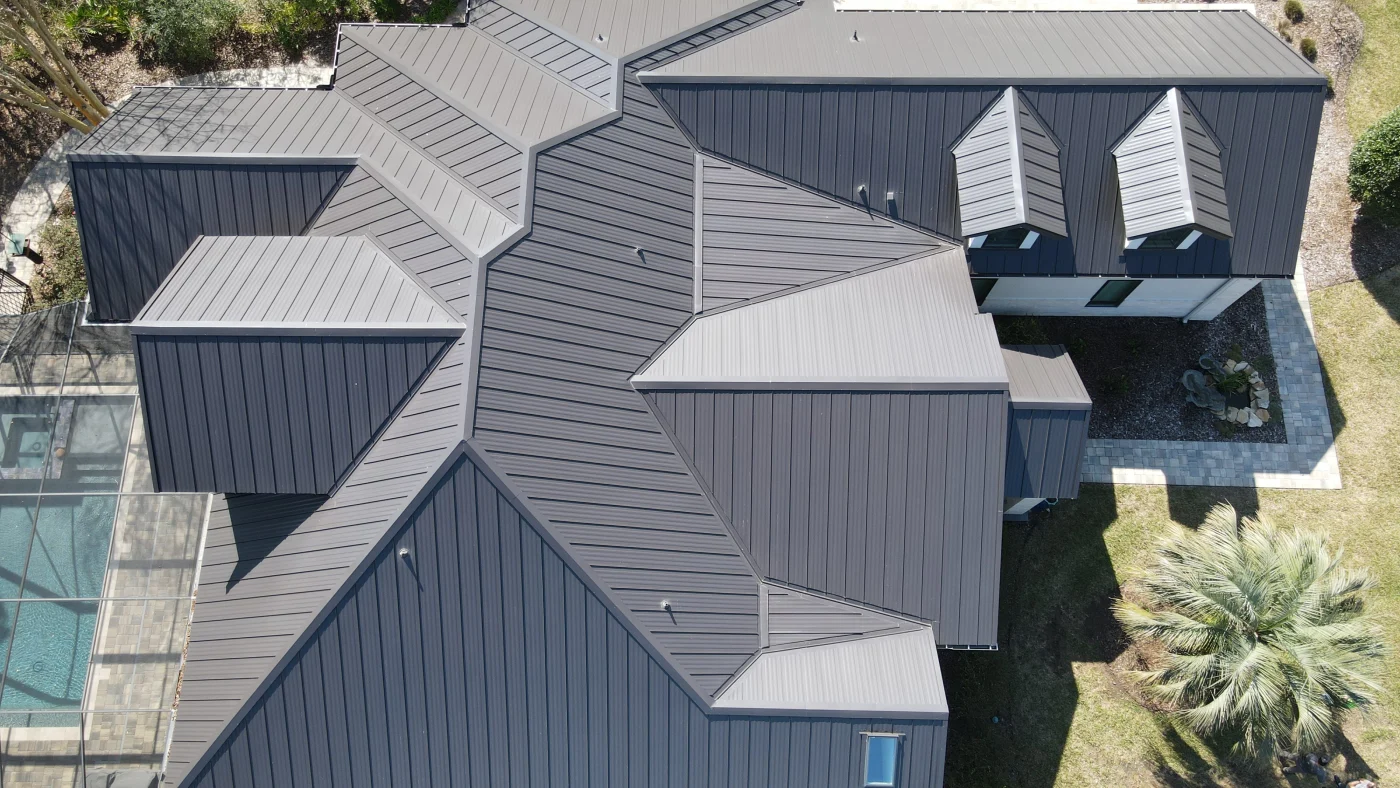 Drone view of a newly installed gray metal roof