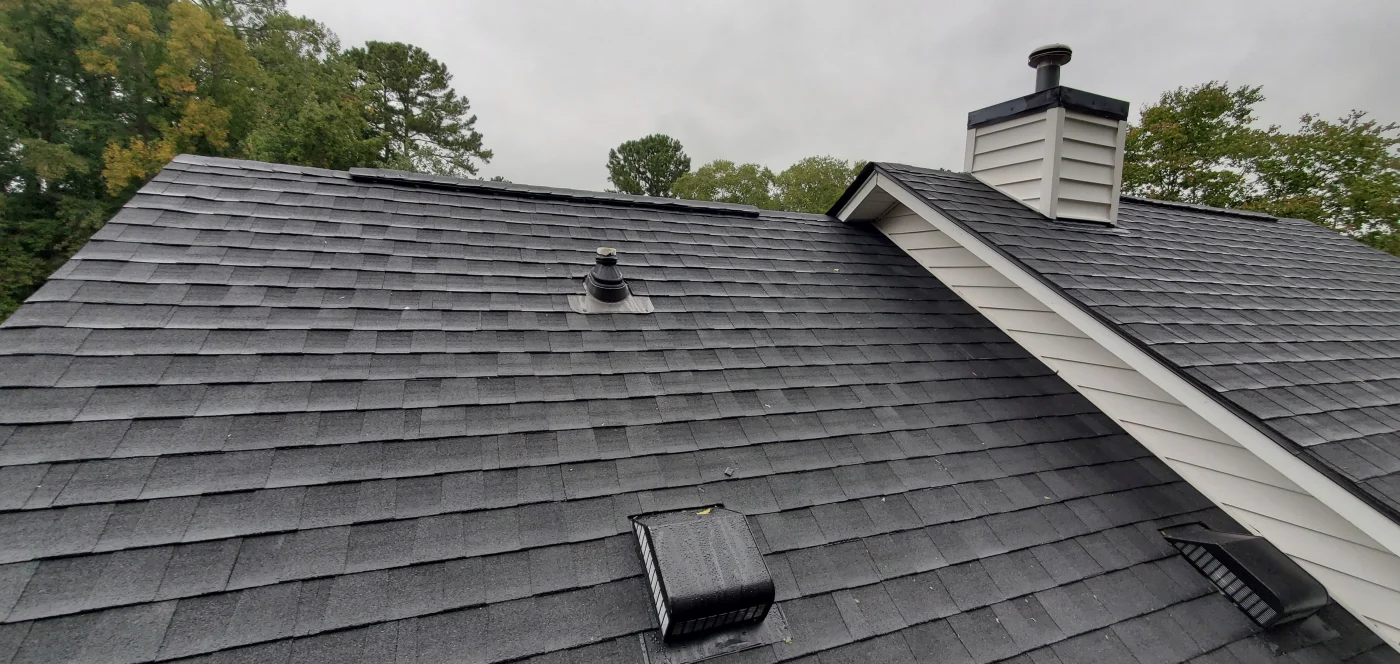 Close up of an asphalt shingle roof on a house