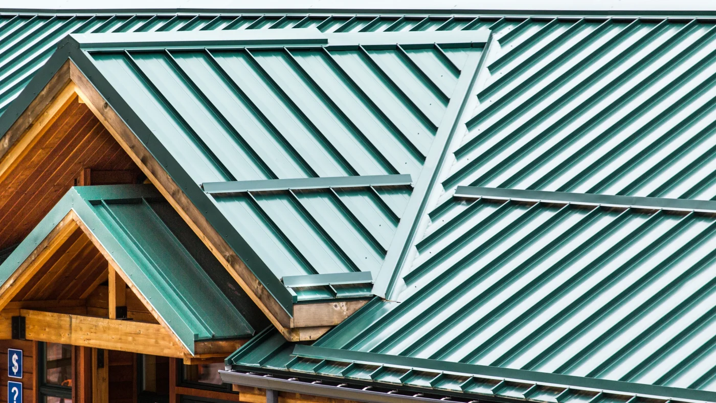 A business with a green metal roof