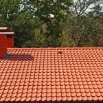 The Roof Is Covered With Red Tiles