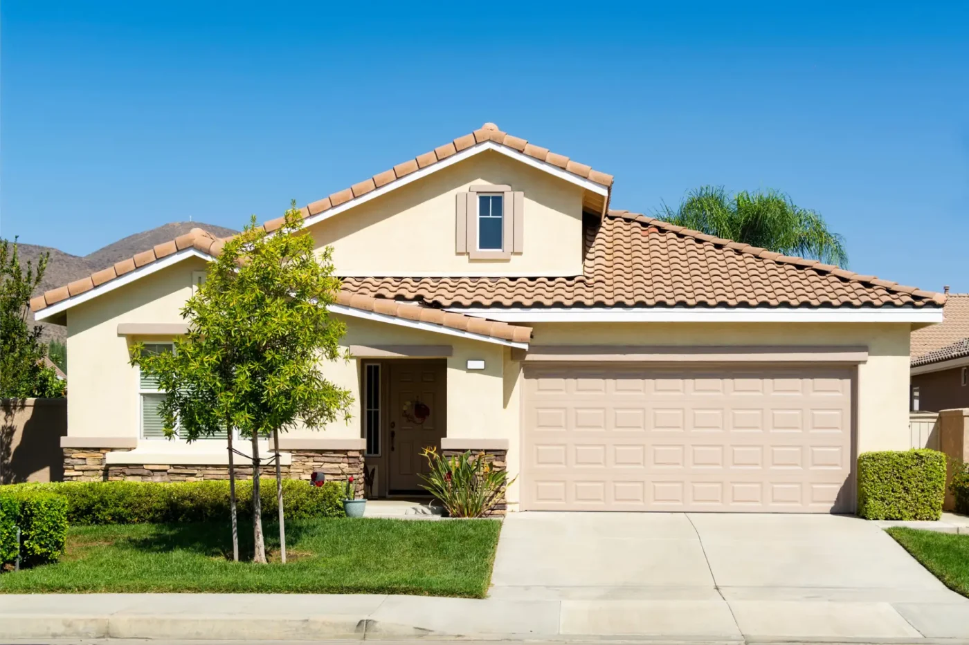 Fantastic brick home with dark blue asphalt shingled roof