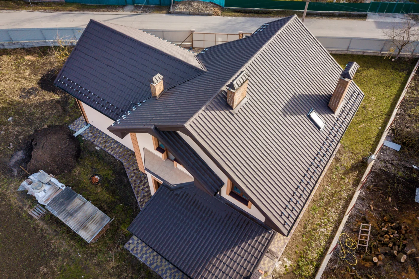 Aerial Top View Of Building Steep Shingle Roof, Brick Chimneys A Aerial Top View Of Building Steep Shingle Roof, Brick Chimneys A