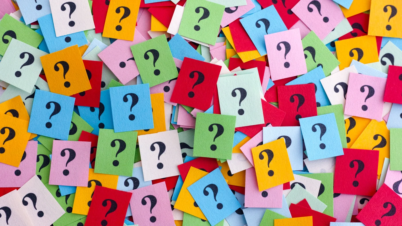 Roofing FAQ | Central Florida | Universal Roof & Contracting Hundreds of sticky notes with question marks in Central Florida | Universal Roof & Contracting