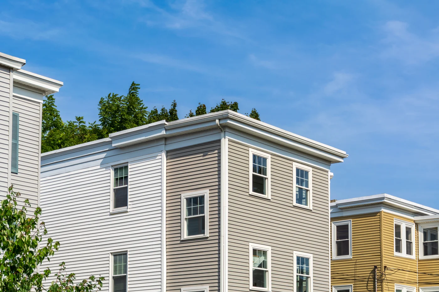 Stunning flat roofs on a row of suburban homes