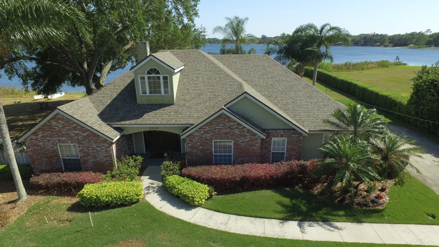 Effective Roofing Results | Universal Roof & Contracting A tile roof beneath dark storm clouds